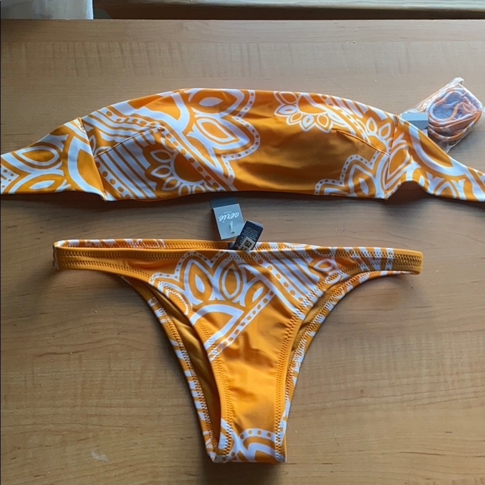 Yellow bandeau bikini top and cheekier bottoms